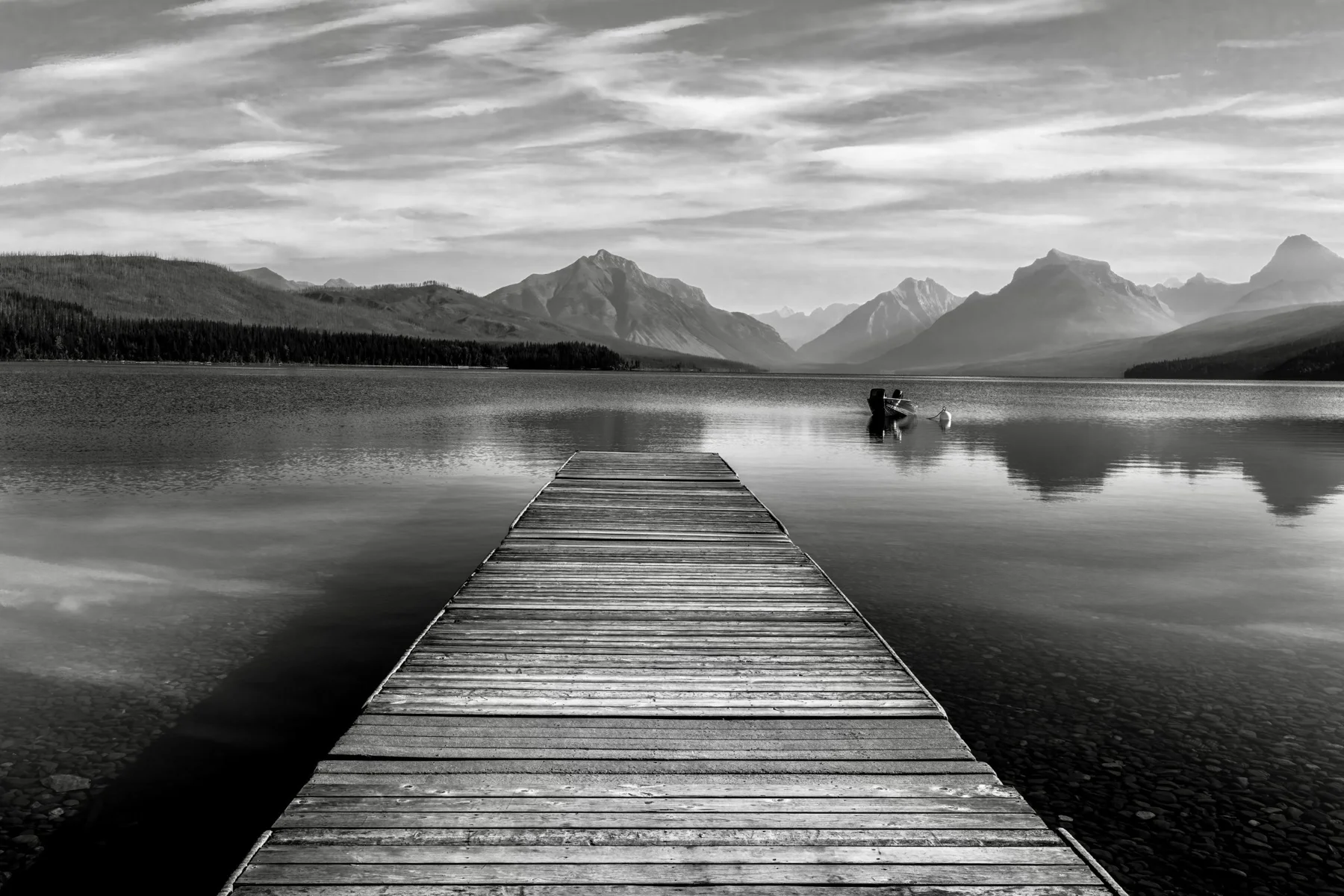 A peaceful lake and mountain landscape from Ascent Mortgage Partners’ Montana photography